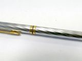 a pen that is sitting on top of a table