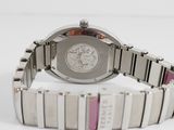 an image of a close up of a wrist watch on a white surface