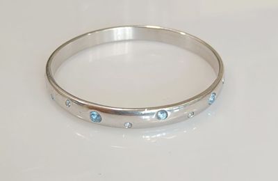 Yves Saint-Laurent - Bracelet jonc en argent 925/°° et incru…