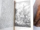 an open book with a picture of a group of people on it