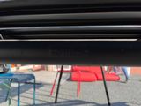 a close up view of a car ' s exhaust pipe