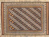 a rug on a wooden floor with a wooden floor