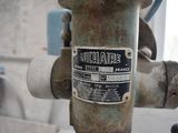 a close up of a metal pipe with a label on it