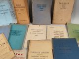 a lot of books that are sitting on a table