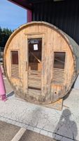 1 sauna en bois circulaire situé en extérieur en l'état