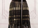 an image of a dress on a mannequin stand