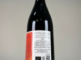 a bottle of wine that is sitting on a table