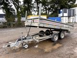 a trailer that is sitting in the dirt