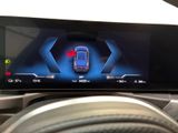 an image of a car ' s dashboard with a digital display