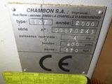 une étiquette sur le côté d'une machine qui indique que le chambon est un