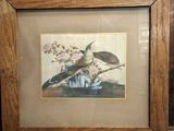 a picture of two birds sitting on a tree branch