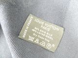 the label of a louis vuitton bag is shown on the back of the bag