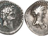 a silver coin with an image of a woman on it