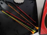 four arrows in a black case with red and green arrows