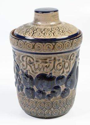 an image of a blue and white jar with elephants on it
