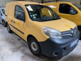 yellow and black van parked in a garage next to other vehicles
