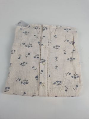 an image of a close up of a small bag with a flower pattern