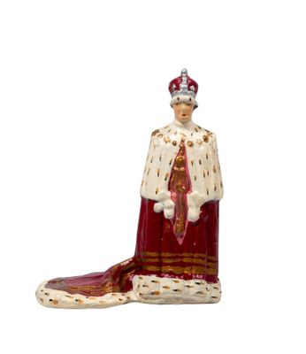 an image of a figurine of a king wearing a crown