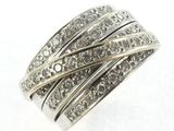 a close up of a ring on a white surface