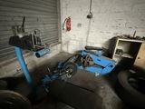 a motorcycle that is sitting in a garage