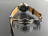 a watch that is sitting on top of a table