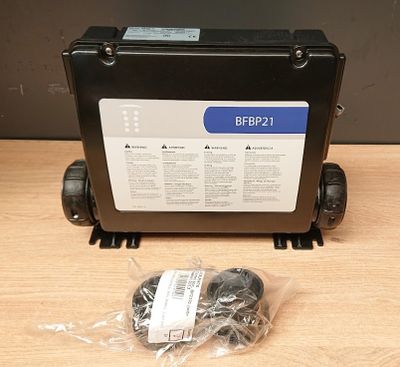 an image of a black box with a bunch of screws on top of it