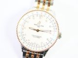 an image of a close up of a wrist watch on a white surface