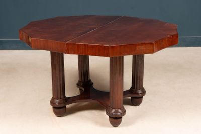 a wooden table with two legs and a wooden top