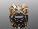 an image of a diamond ring on a reflective surface