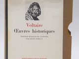 an open book with a picture of a man on it