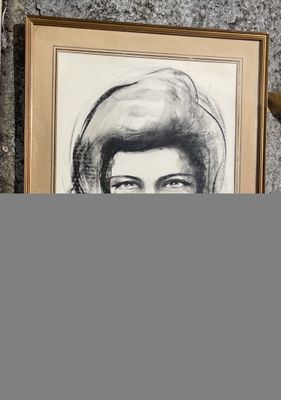 a picture of a woman that is on the wall