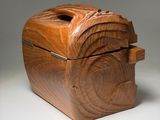 an image of a wooden box sitting on top of a table
