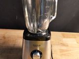 a blender that is sitting on a wooden table