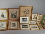 many framed pictures of people and animals on the table