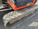 a close up of a tractor tire tracks on the ground