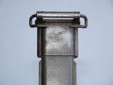 a close up of a metal object with a metal buckle