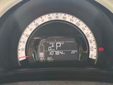 a close up of a speedometer on a car dashboard