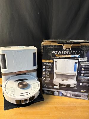 an image of a microwave and a toaster sitting on a table