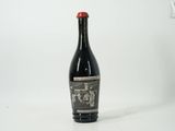 a bottle of wine that is sitting on a table