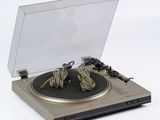 a turntable with a record player attached to it