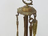 a metal stand that has a bunch of different items on it