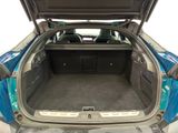 a trunk of a car with the back door open