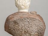 marble bust of a man on a pedestal on a table