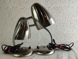 two lamps that are sitting on a table