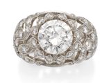 une bague Art déco sertie d'un diamant, signée Van Cleef