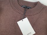 a brown sweater with a tag on the back of it