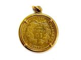 an image of a gold coin with a bird on it