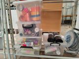 a shelf with a lot of craft supplies on it