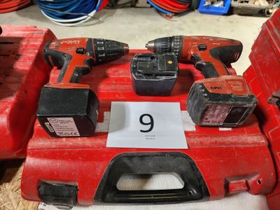 une boîte à outils rouge sur laquelle figure le chiffre 9