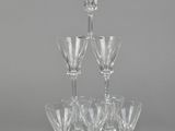 a group of wine glasses sitting on top of each other